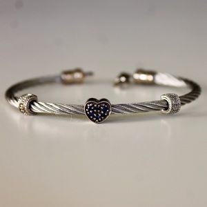 Cable bracelet barley worn.